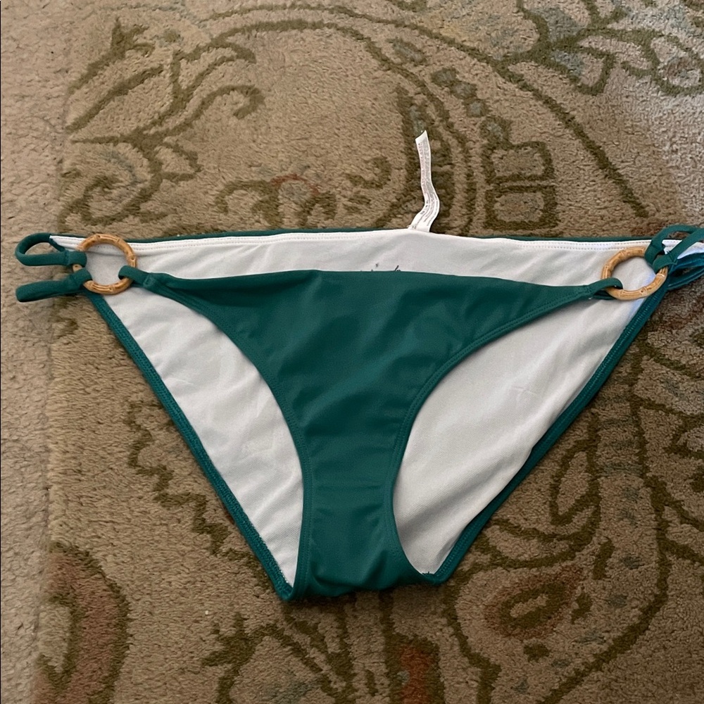Out from under Teal Bikini Bottom
